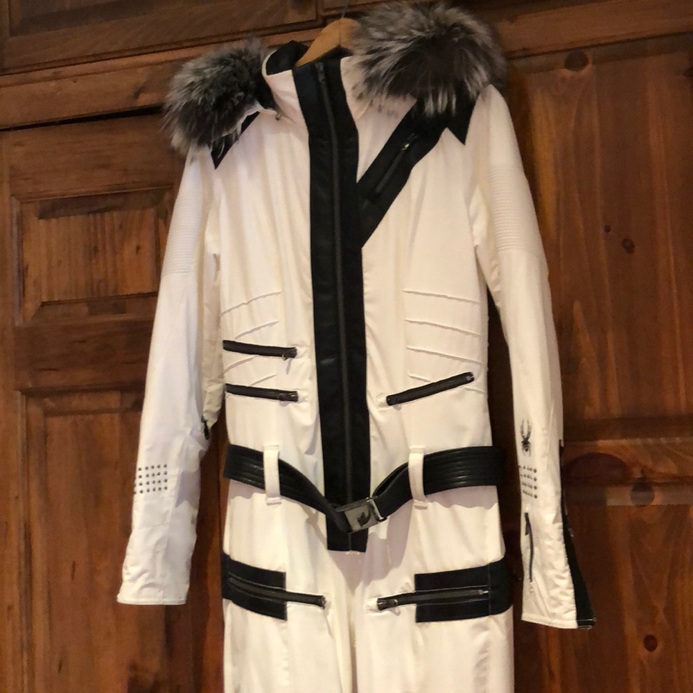 Spyder one piece ski suit with removable fur hood.